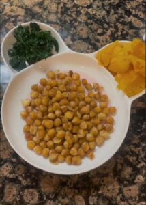 Roasted chickpeas and honeynut squash with steamed kale