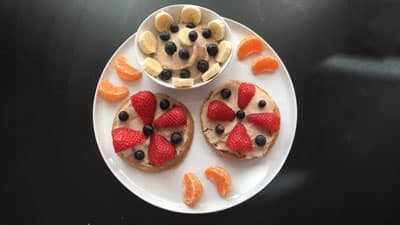 A plate of food with fruit on it